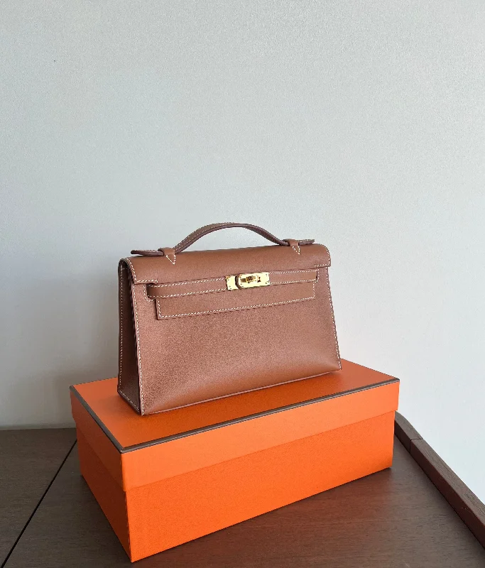 Hermès Kelly Pochette Gold Swift GHW